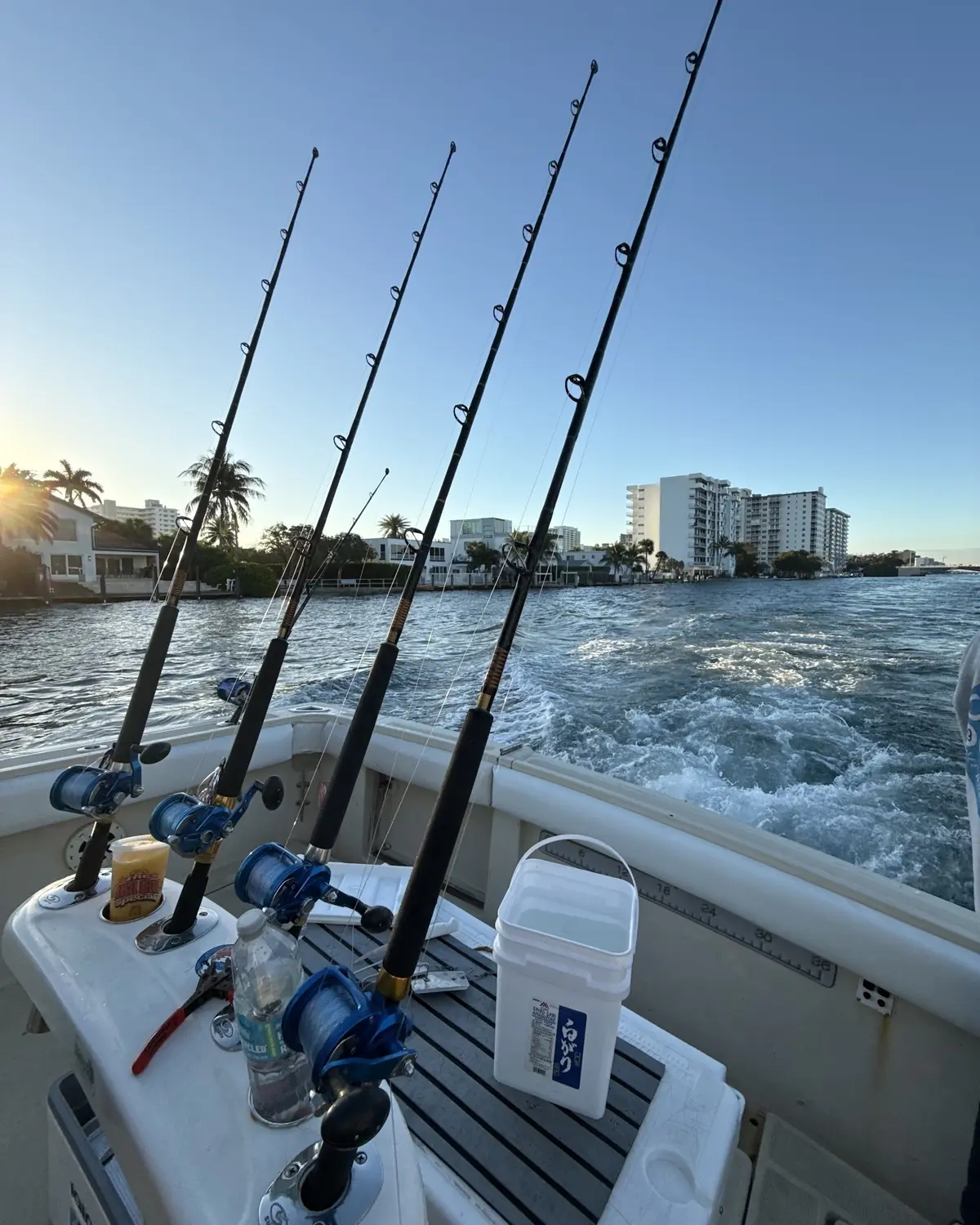 Rods set in the holders as the Gradyful boat heads out of Hillsboro Inlet at sunrise